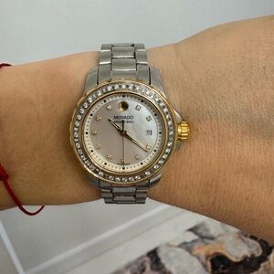Movado watch with diamond and gold basel